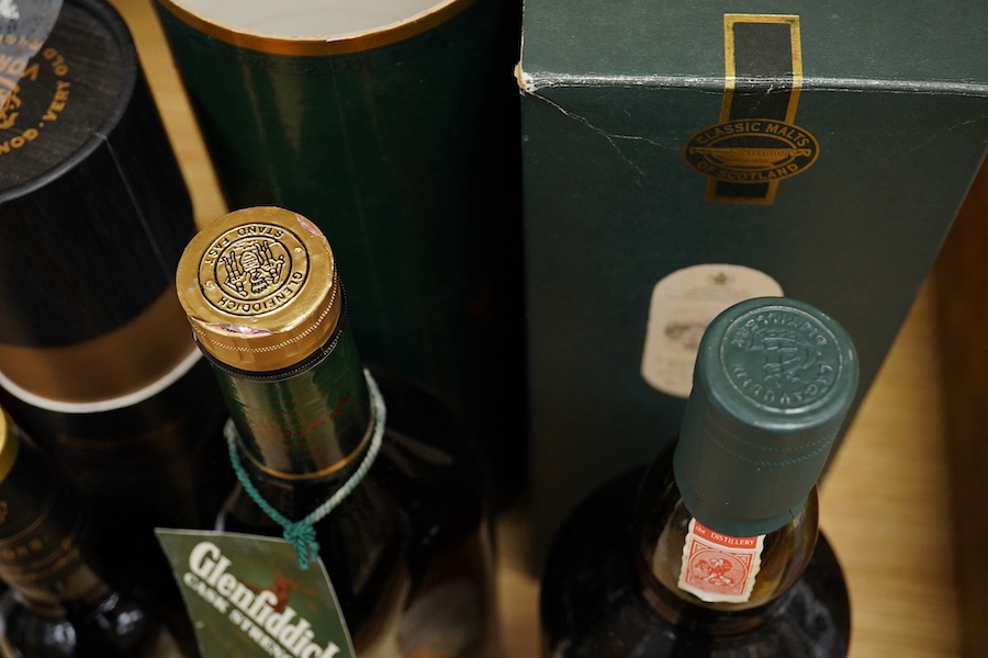 A boxed bottle of Lagavulin single Islay malt whisky, boxed Glenfiddich cask strength single malt whisky, a boxed bottle of Apostoles old sherry and a boxed bottle of Camus Napoleon cognac (4 bottles) Condition - fair, s